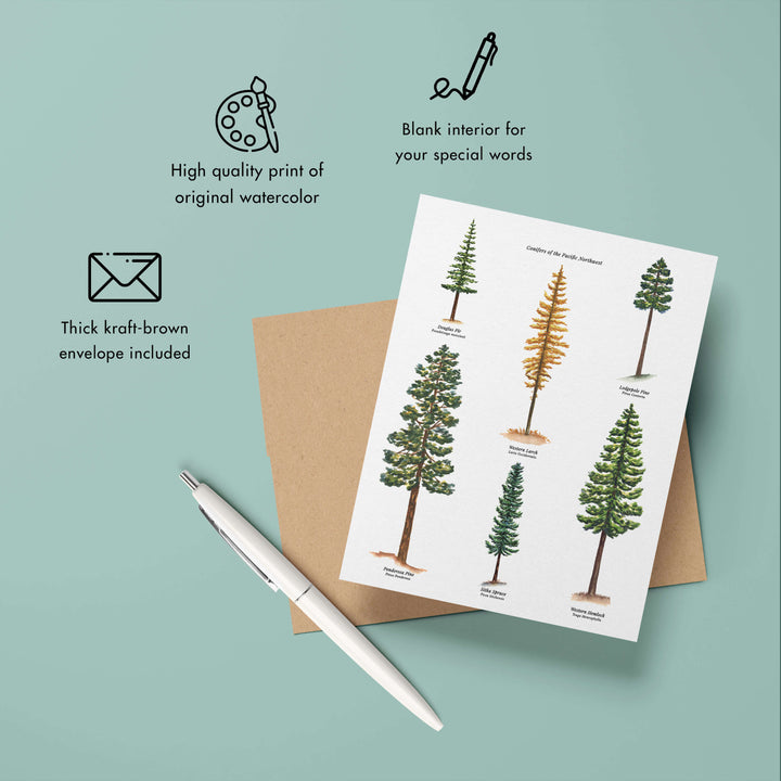 a greeting card with pine trees on it