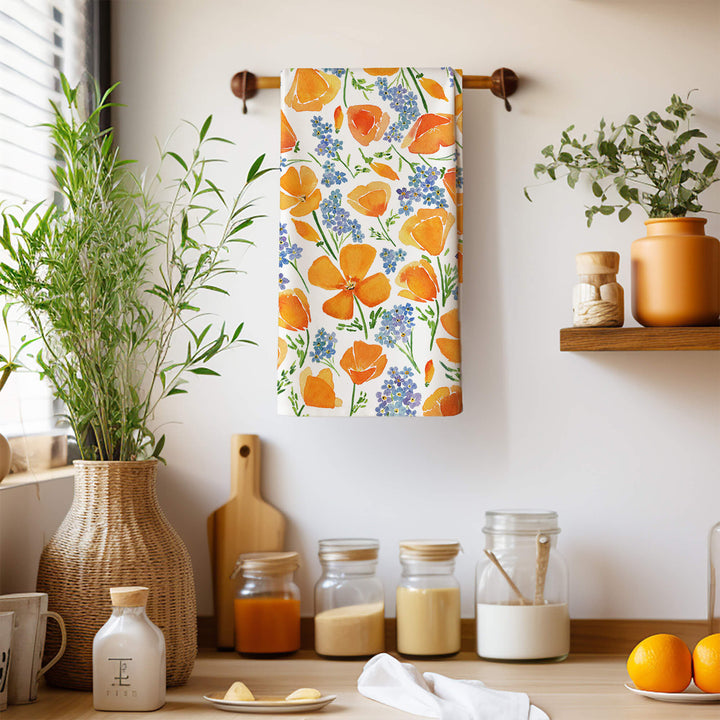 a kitchen with a towel hanging on the wall