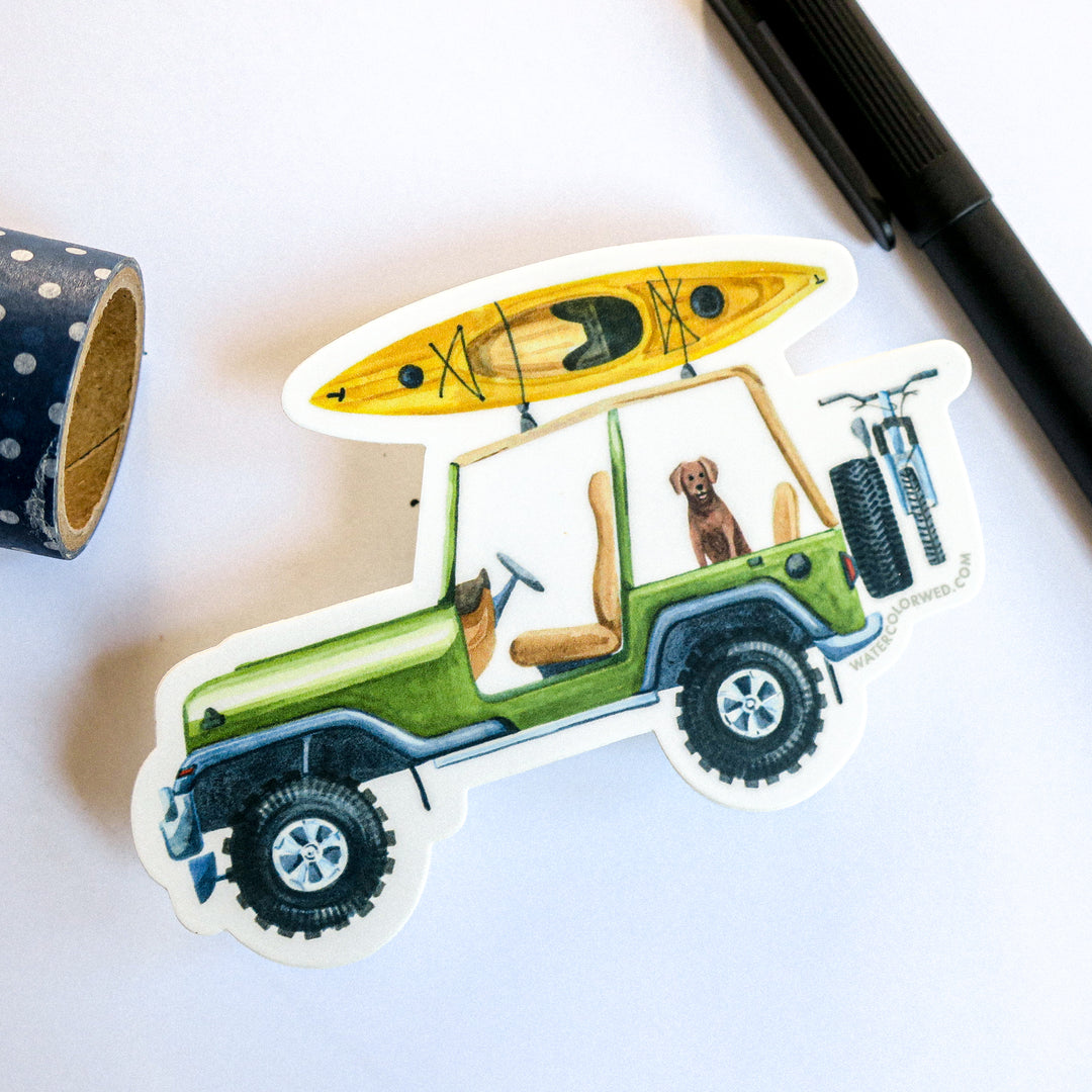 SUV sticker with kayak and dog