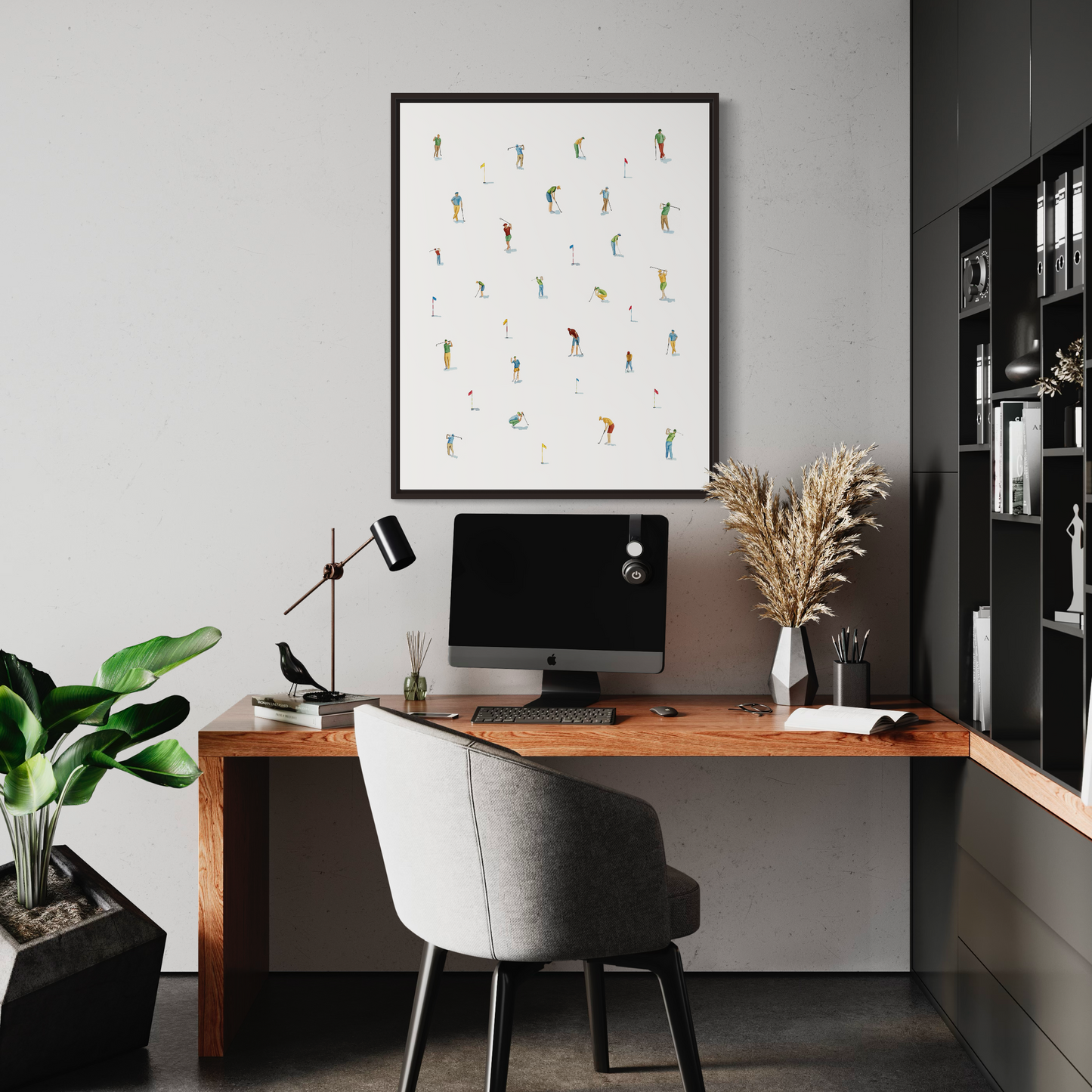 a desk with a computer and a potted plant