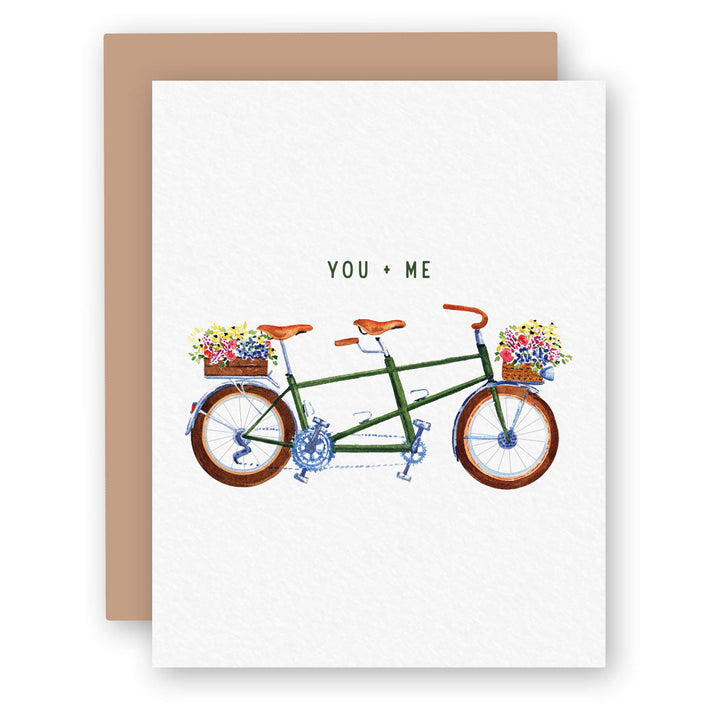 a love card with a bicycle with flowers on it