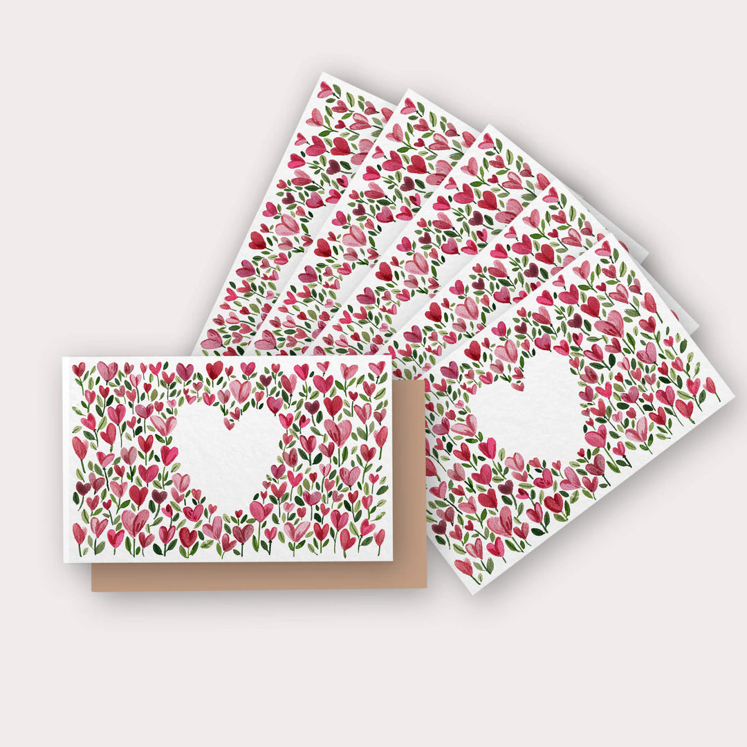 a set of four cards with hearts on them