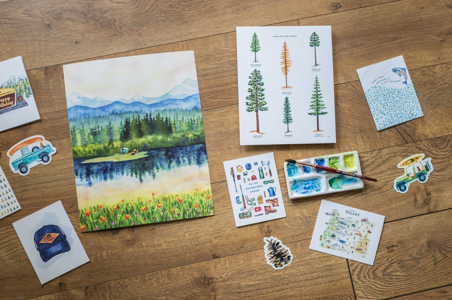 Adventure art and product offerings from Watercolor Wed, including art prints, stickers, and cards