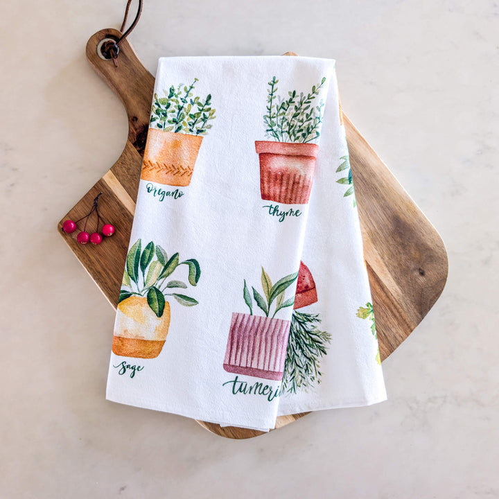 a tea towel with a potted plant on it