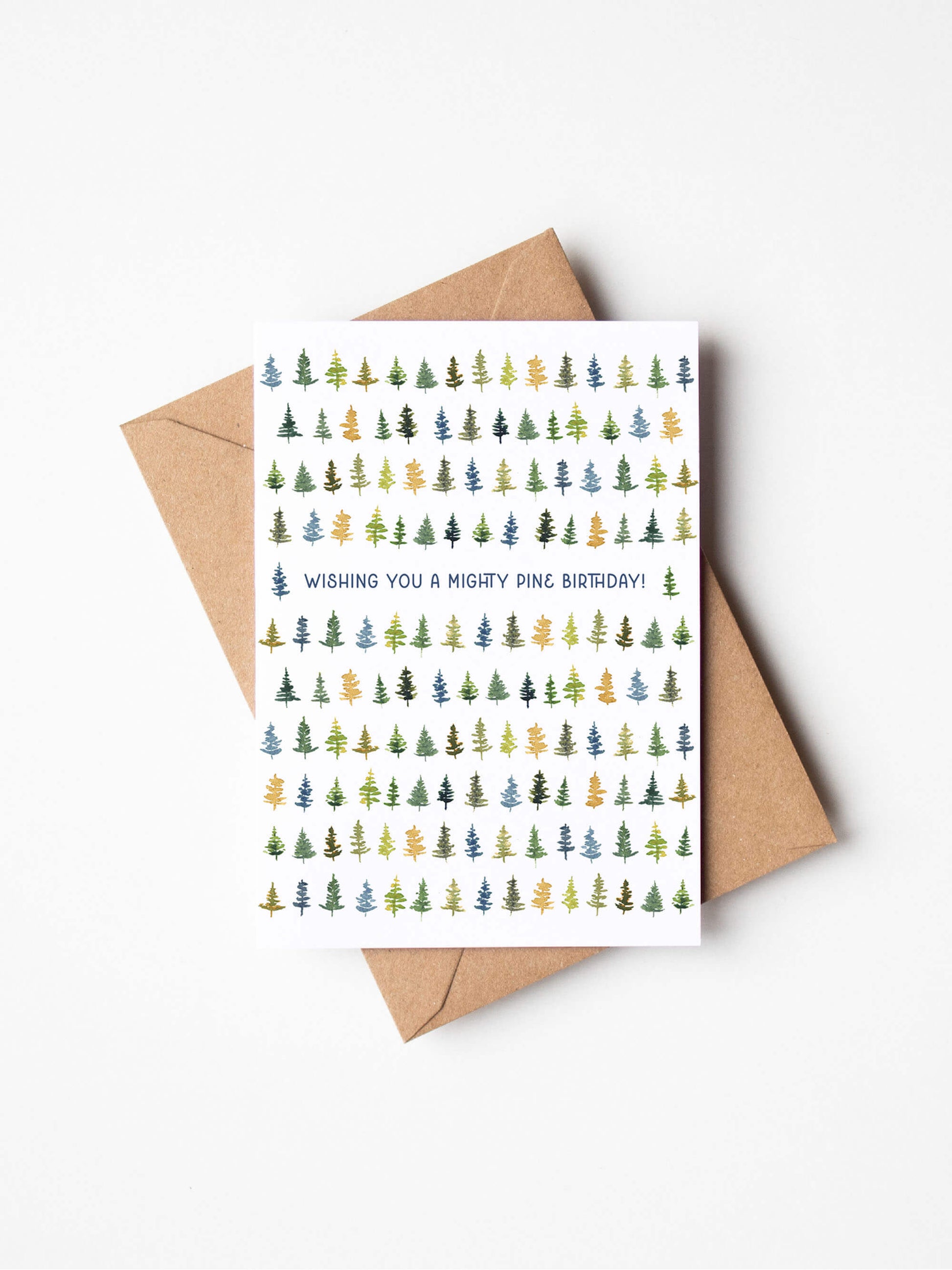 a birthday card with a christmas tree pattern on it