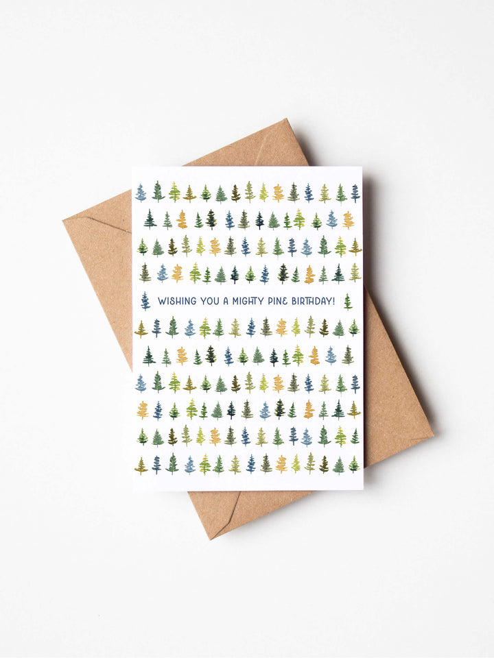 a birthday card with a christmas tree pattern on it