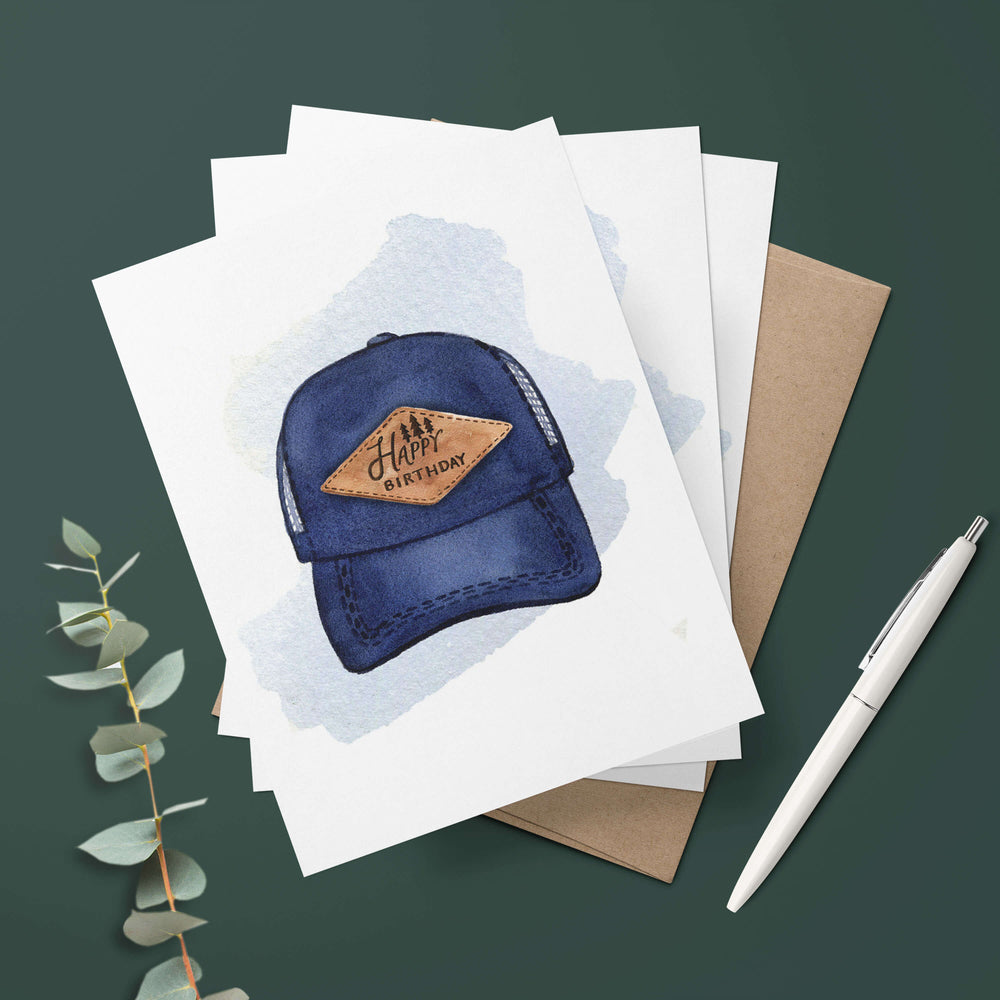a birthday card for him with a picture of a cap on it