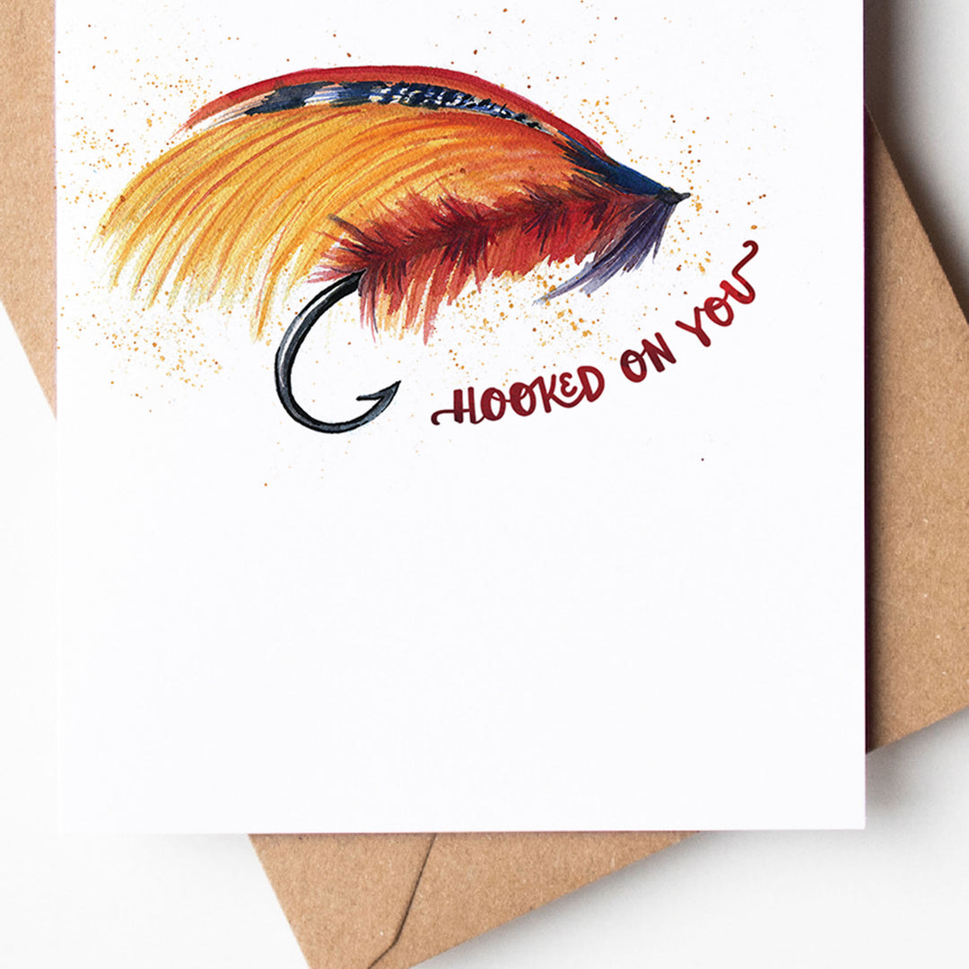 an outdoorsy card with a fly fishing tie on it