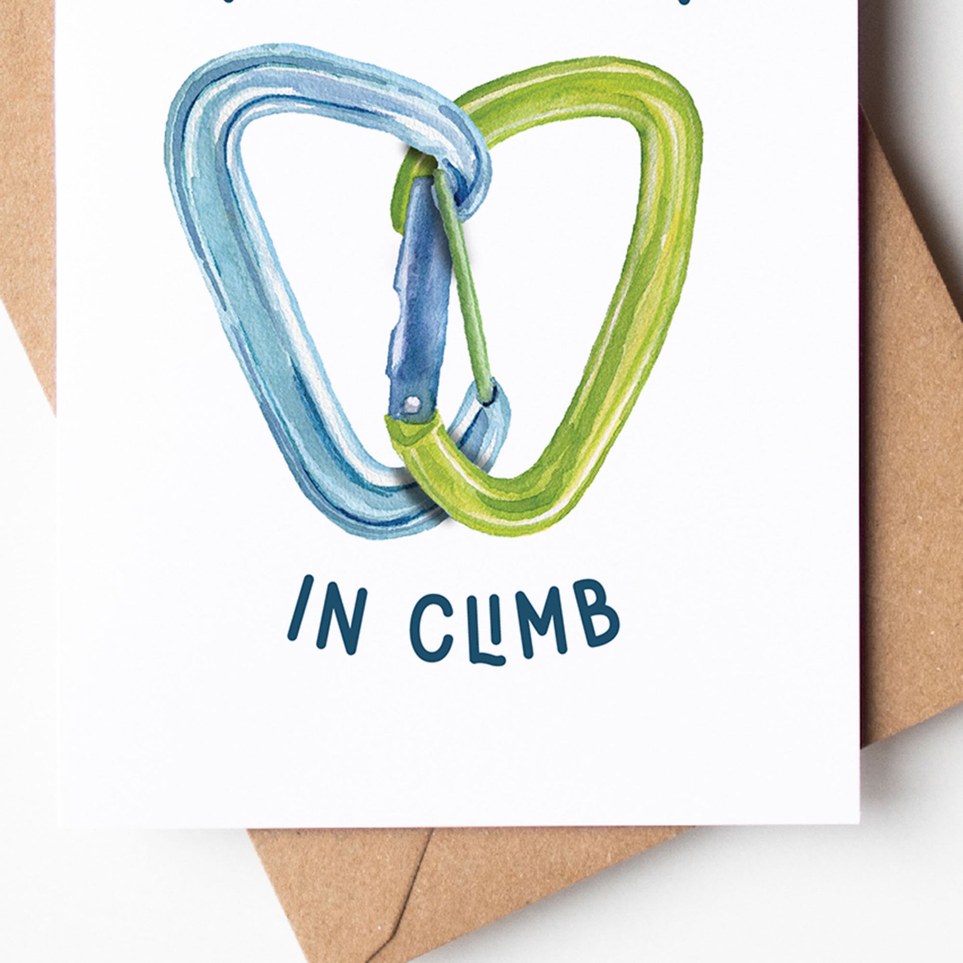 a card with a picture of a pair of carabiners in the shape of a heart