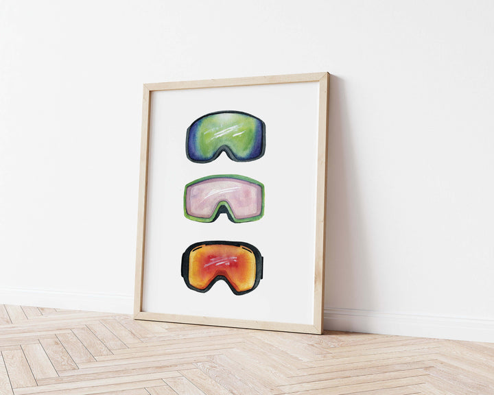 a hand painted watercolor painting of a pair of ski goggles