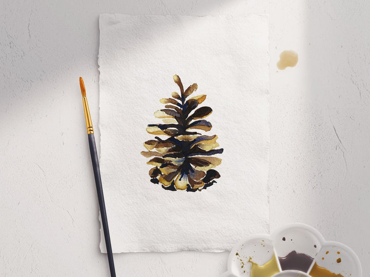 a painting of a pine cone on a piece of paper